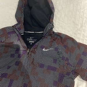 Nike storm jacket (Fully reflective) Like new. Amazing condition.